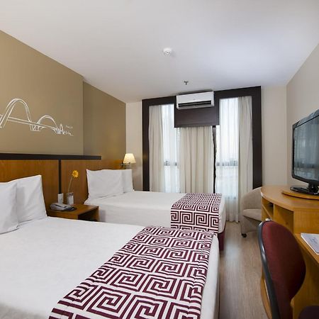 Comfort Hotel Тагуатинга Номер фото