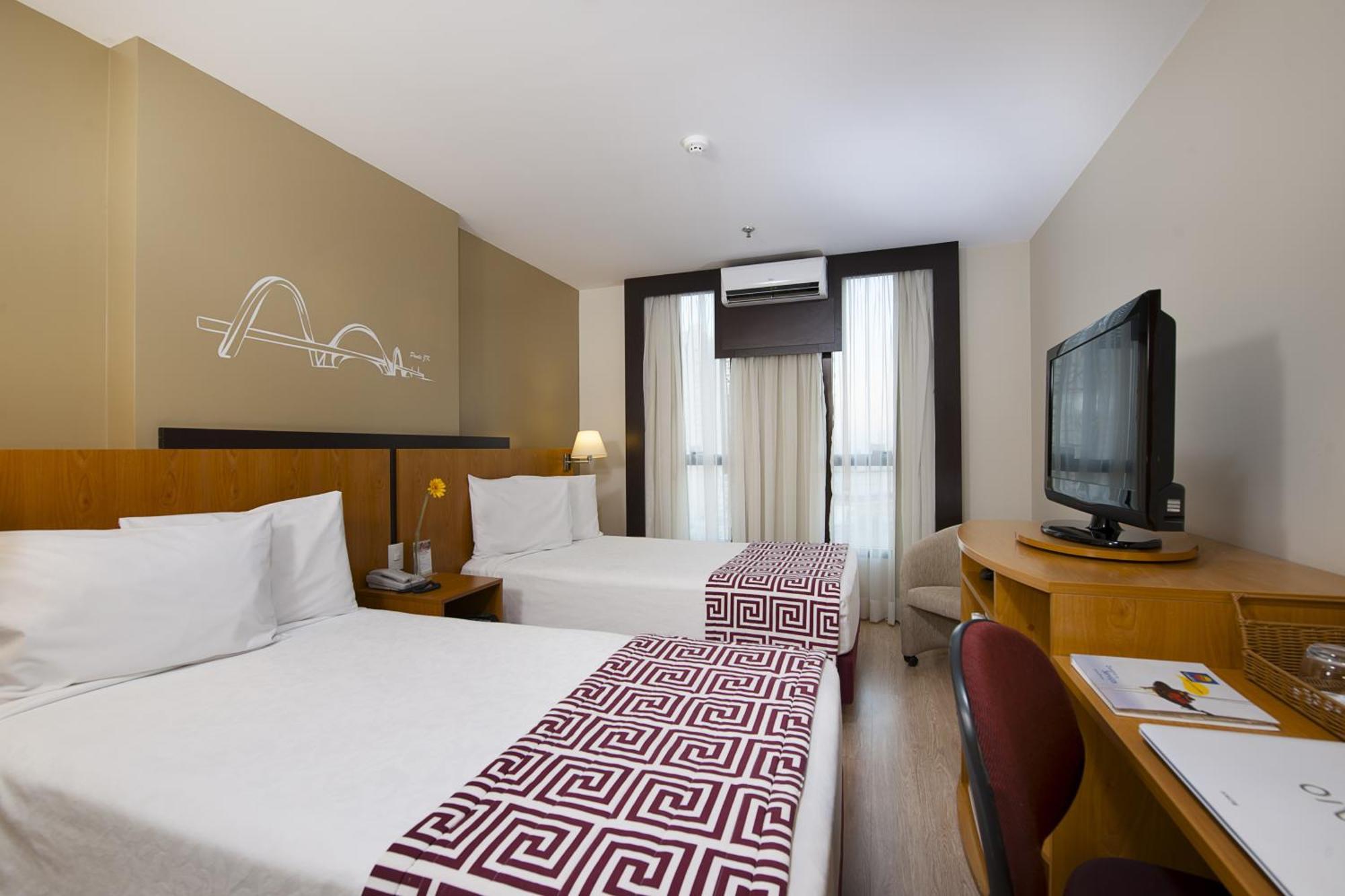 Comfort Hotel Тагуатинга Номер фото